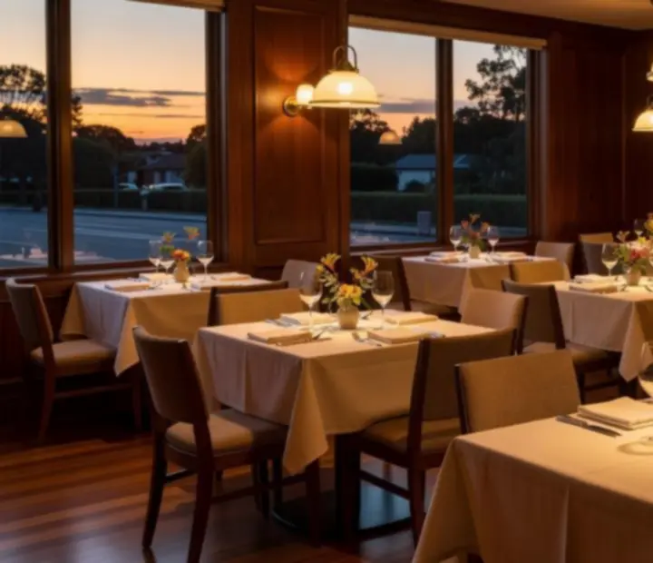 Lamplit restaurant table prepared for reservations at The Lamplit Parlour